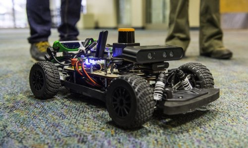 The Biswas lab demos robotic cars at campus events like the college donor brunch and Explore UT.