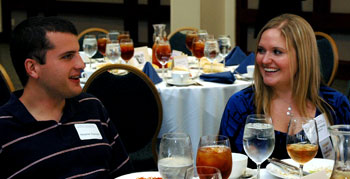 Mary Ann Bailey of Facebook, an FoCS member, visits with UTCS student and scholarship recipient Alexander Espinosa at the 2009 Scholarship Lunch.